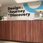 Office-branding-Reception-desk-wrap-with-black-acrylic-letters
